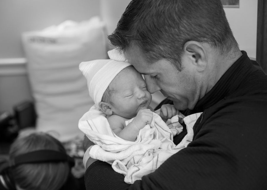 dad and baby embracing